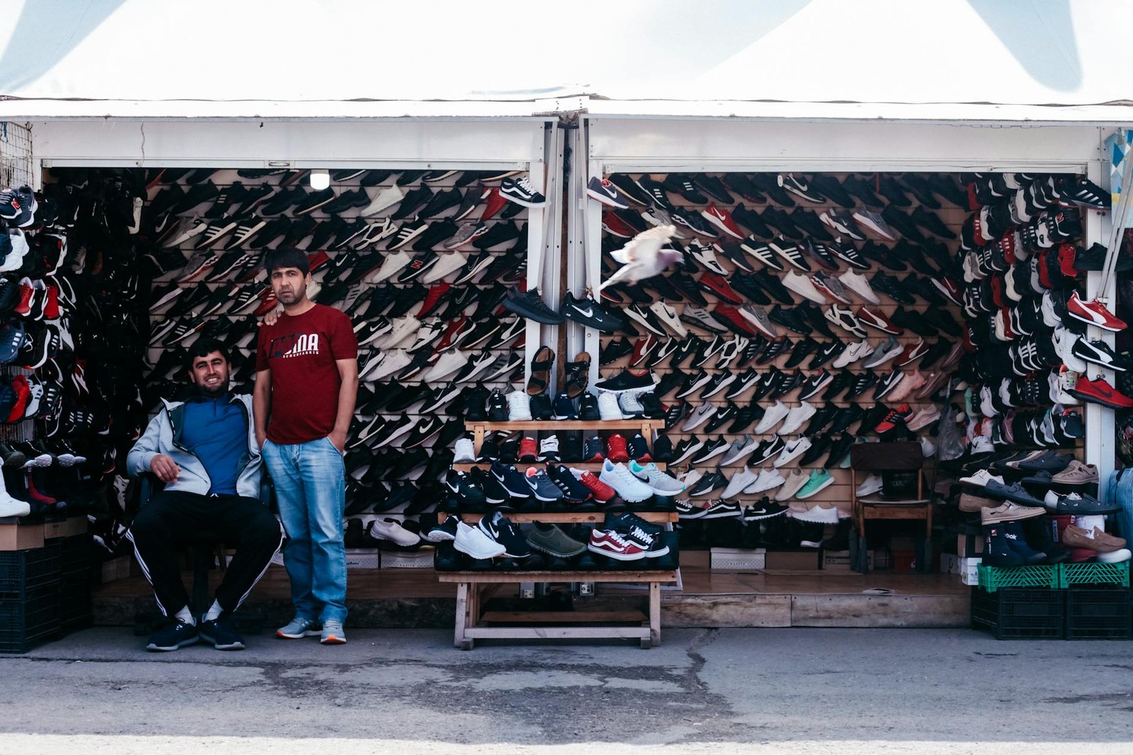 men on a shoe stall