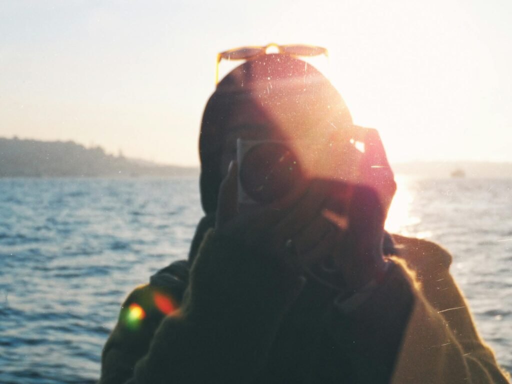 silhouette photography at sunset by the sea