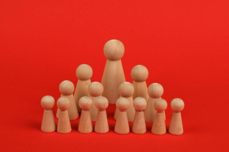 wooden figurines in rows