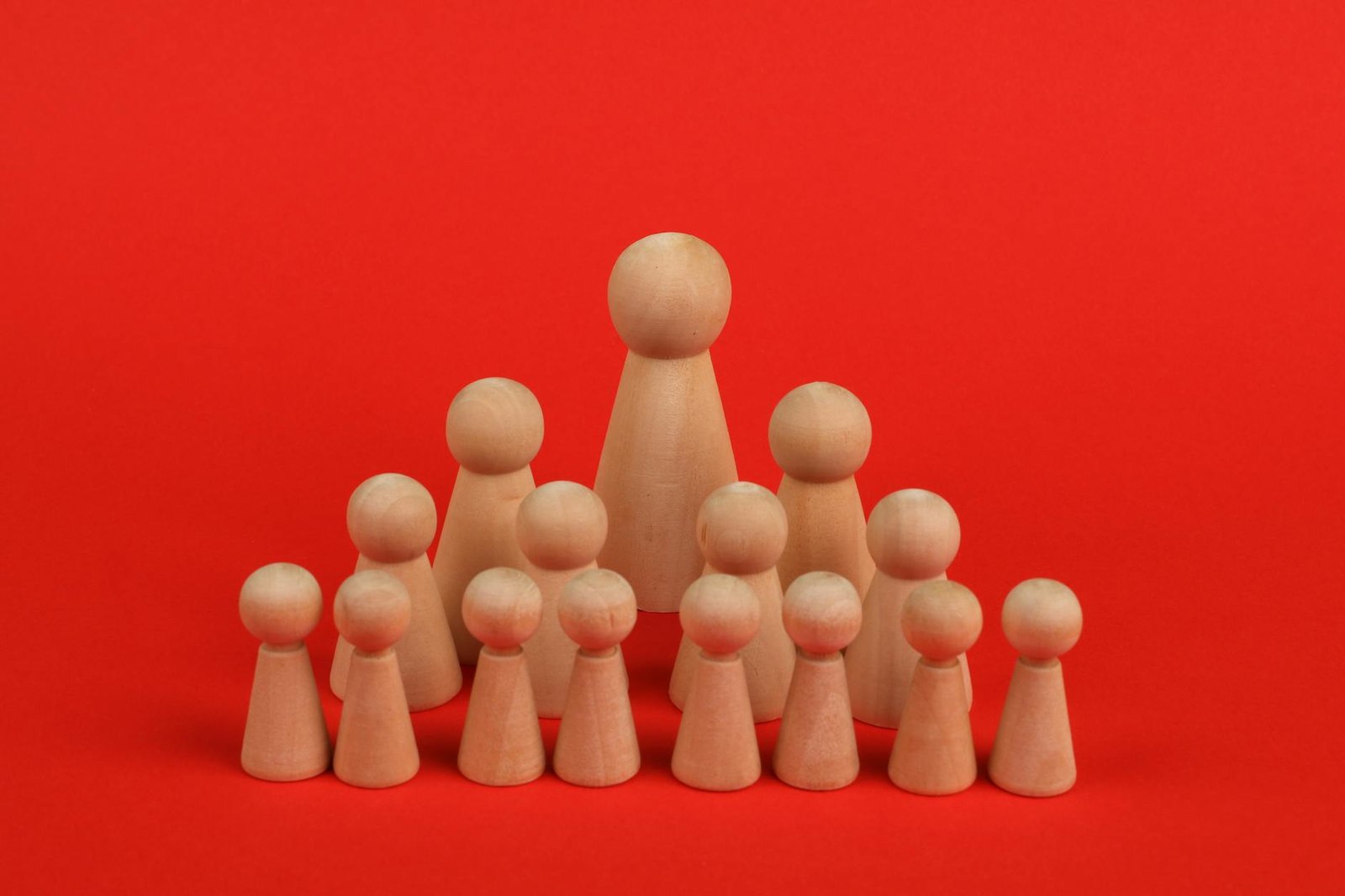 wooden figurines in rows