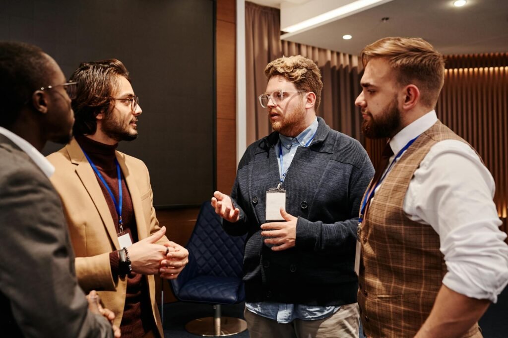 men in discussion at an event