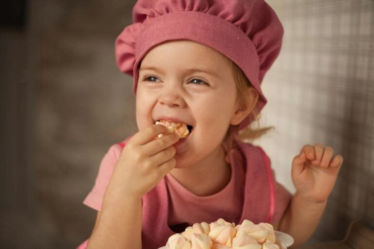 a girl eating marshmallow