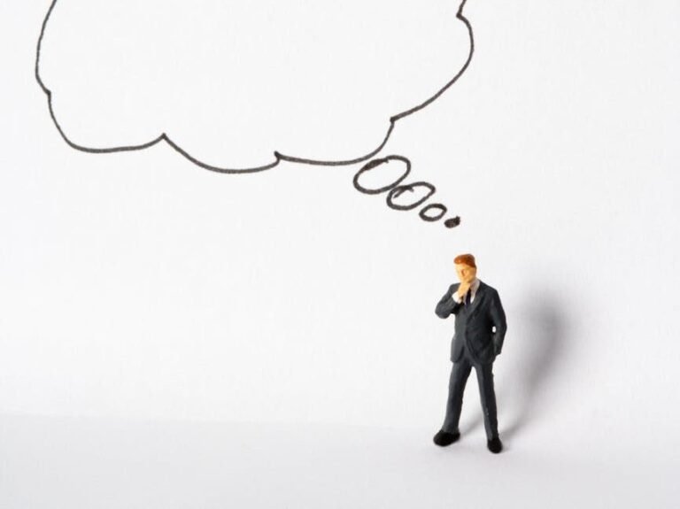 human toy in white background