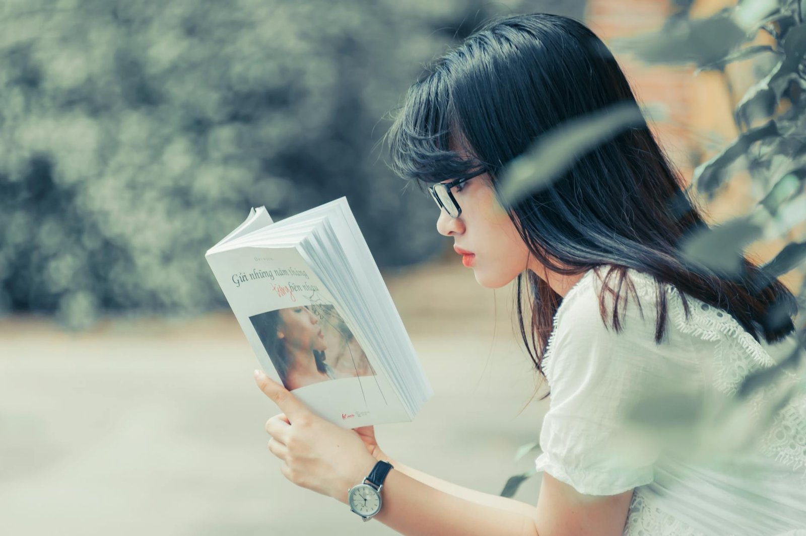 woman reading book
