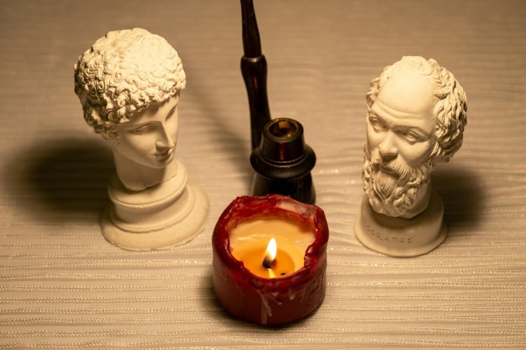classical serenity bust statue with pipe and candlelight