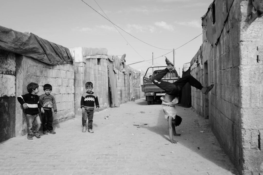 children playing in syrian refugee camp