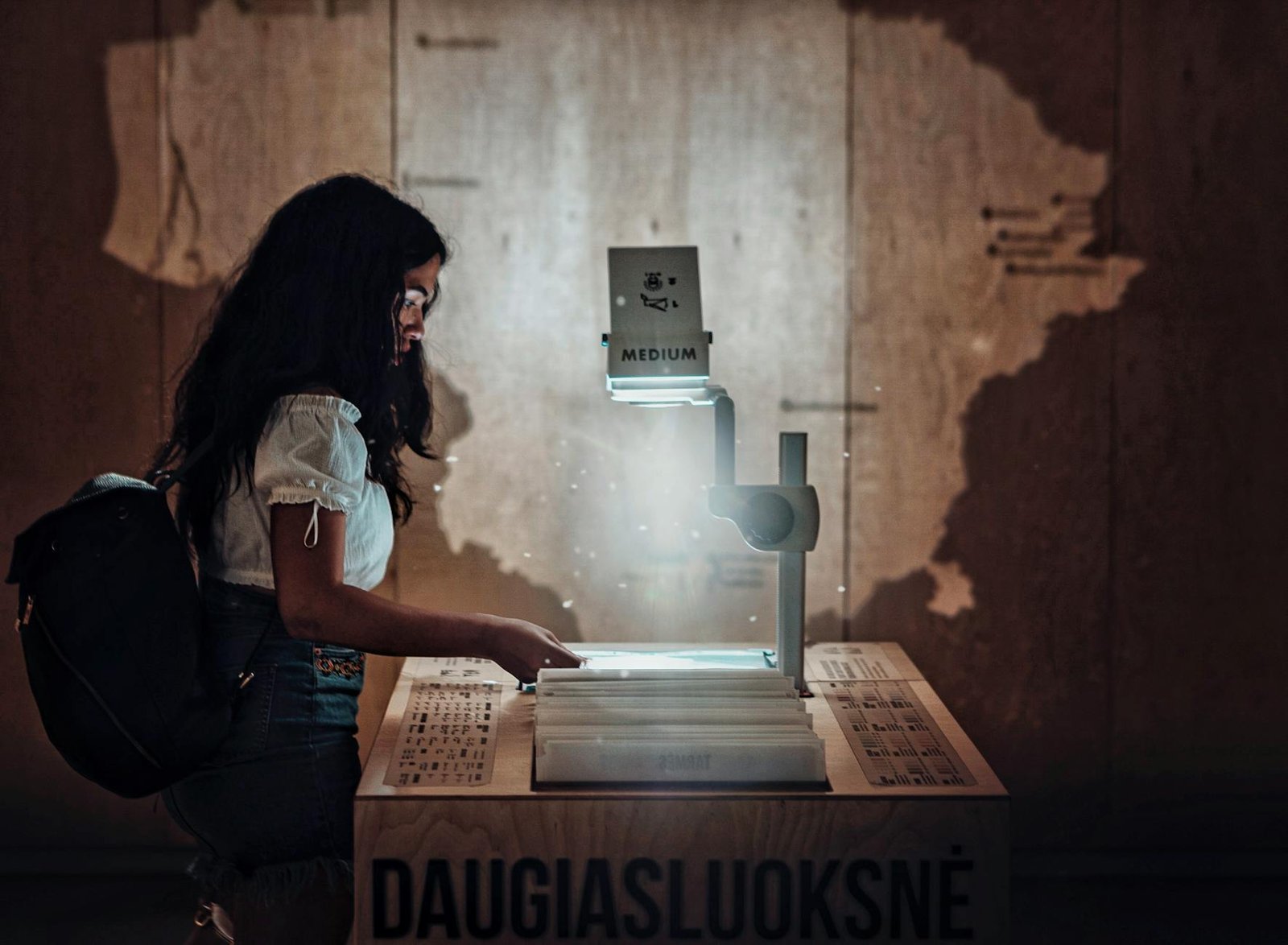 woman using projector