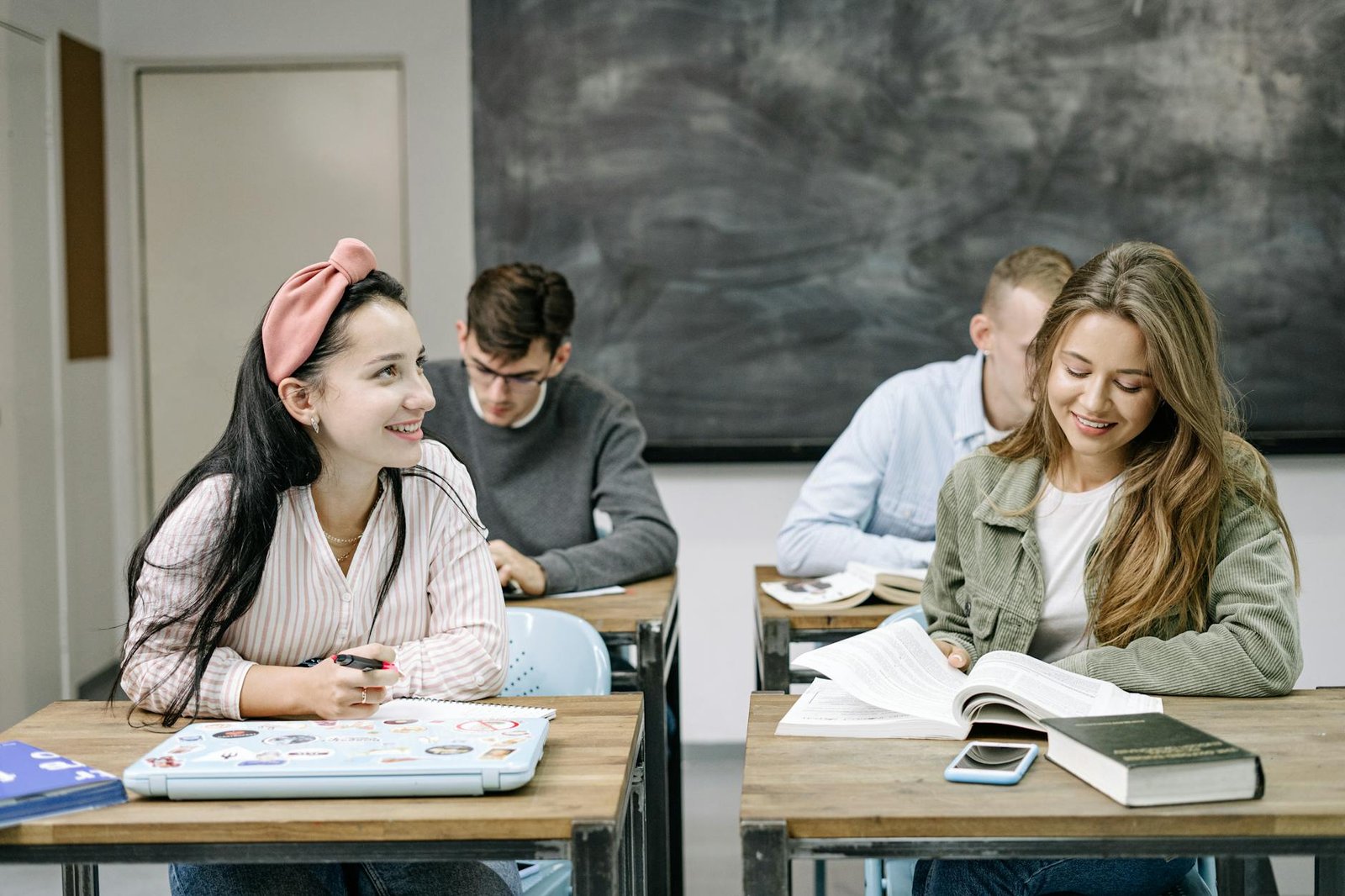 female colleagues seated beside each other