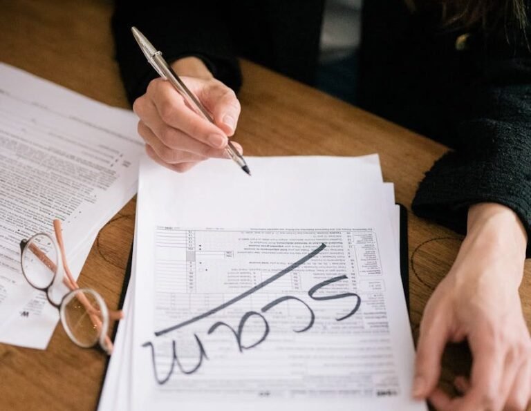 a person writing on a document