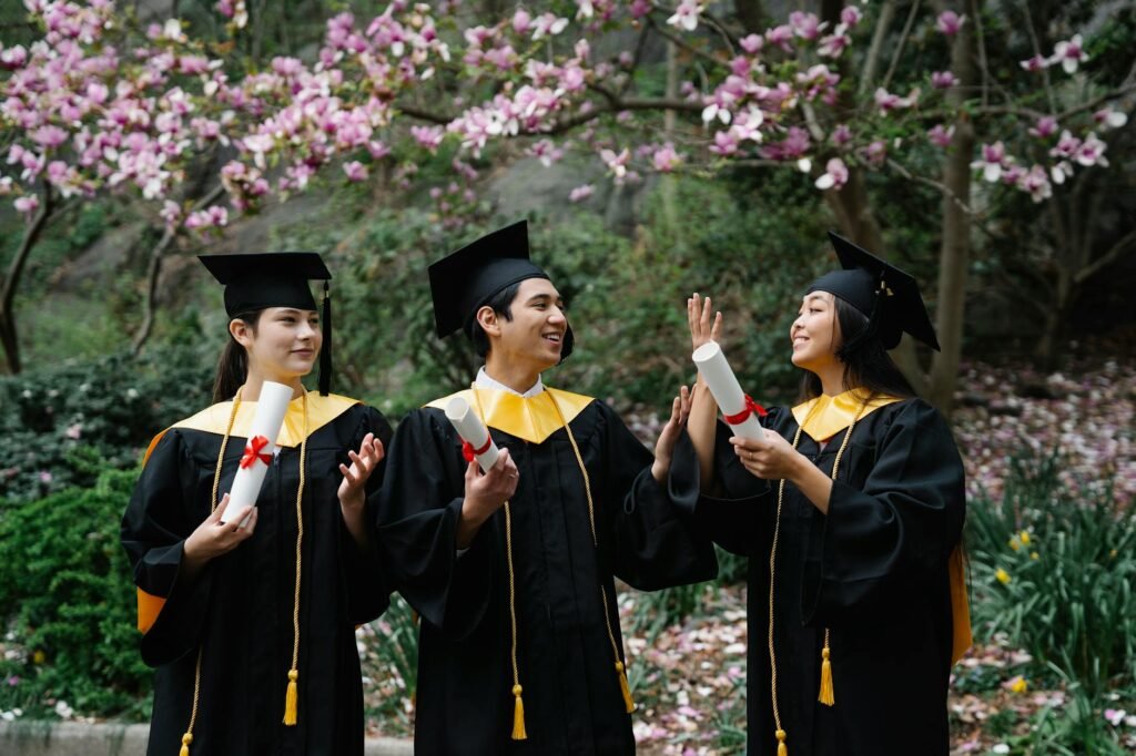 photo of a group wearing black square academic caps