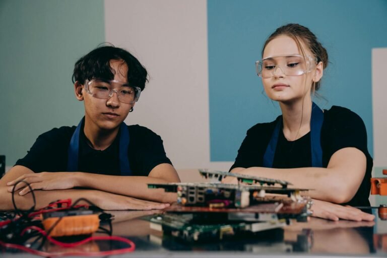 woman and man sitting by table with hardware